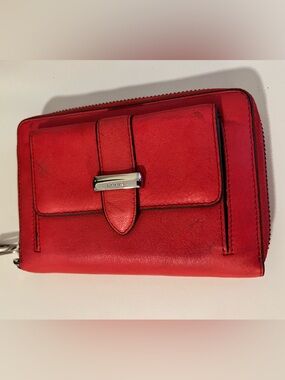 Lodis leather zip-around wallet featuring a front flap pocket rhythmic red